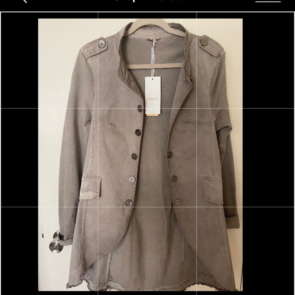 Light denim spring jacket. New with tags